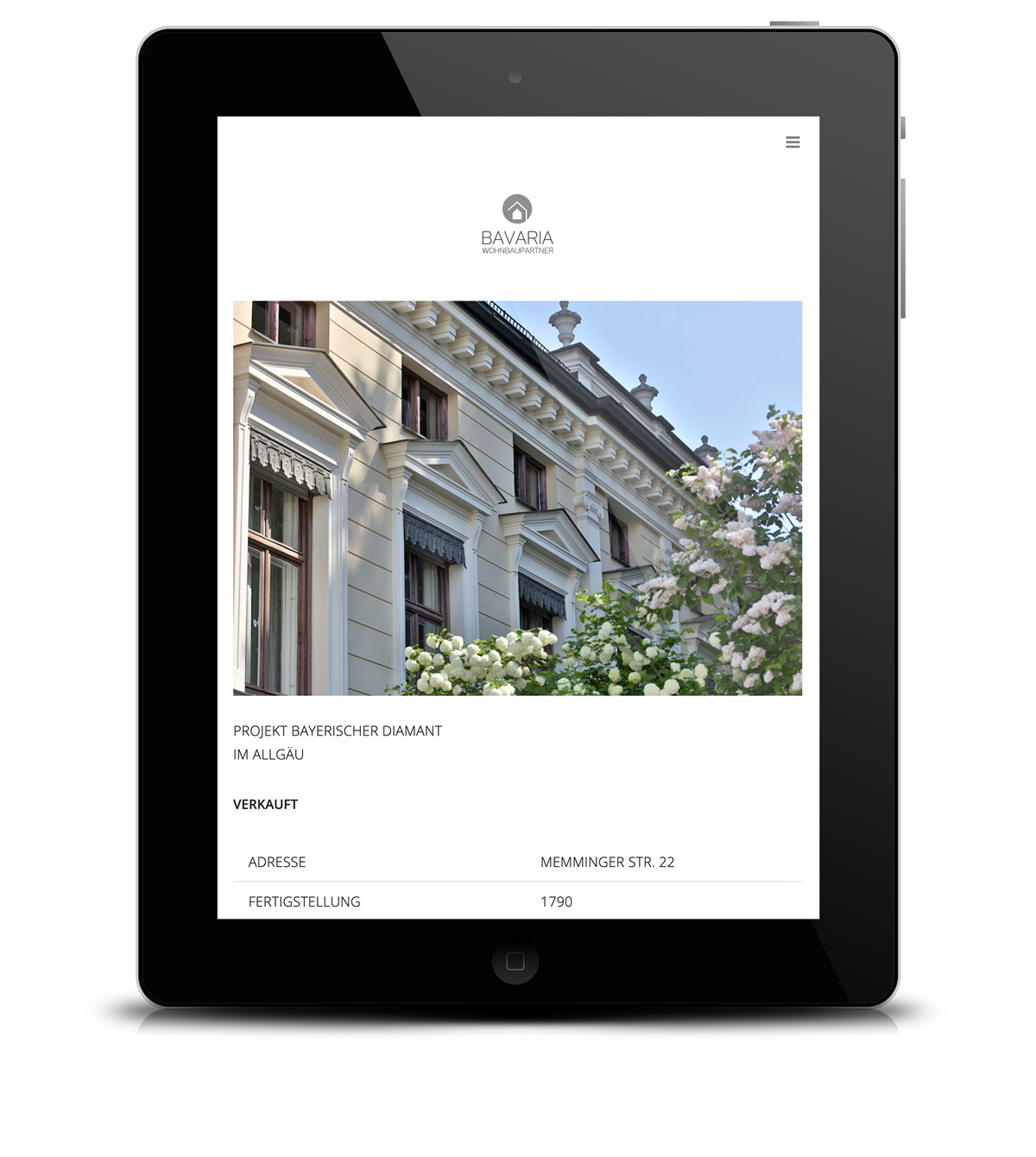 Website für Immobilienmakler auf einem Tablet